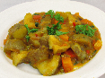 Pompoen en aardperen gegaard in zelfgemaakte curry