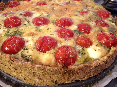 Quiche van cherrytomaatjes en snijbonen met bosuitjes en munt