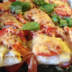 Ovenschotel met schelvis, spinazie en tomaten